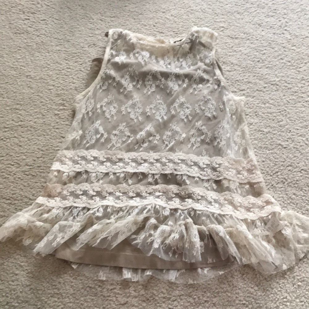 A tan tank top to go under the lace shirt.